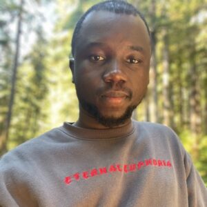 headshot photo of Quincy Jones Yakana Tawal